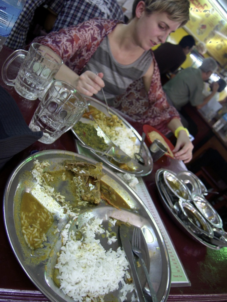 Esther can be seen here with the remnants of our lunch. It was great. And included endless top-ups of veggie curry, pickle and rice.