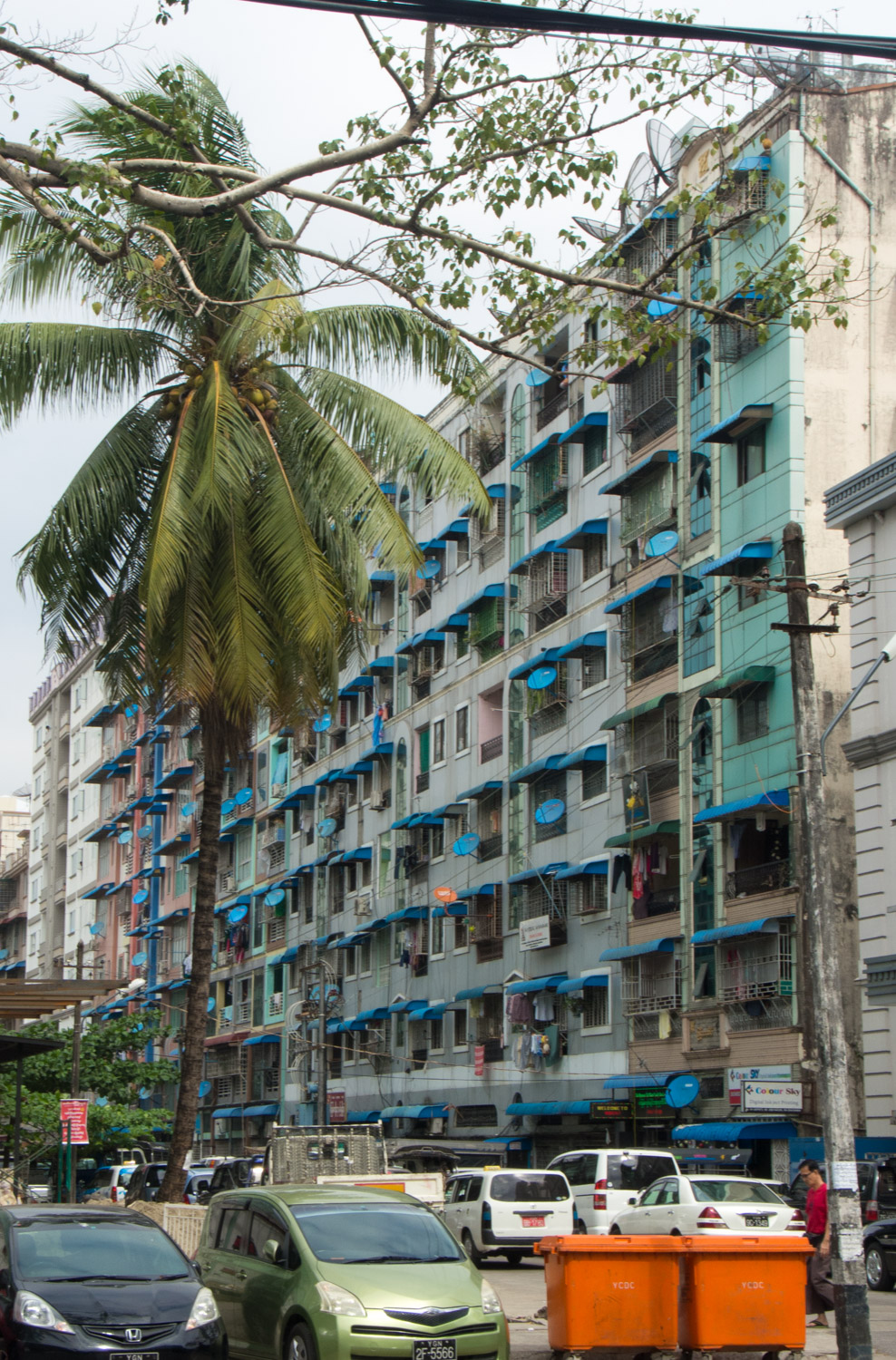 Blue awnings and satellite dishes are a ubiquitous feature of downtown Yangon.