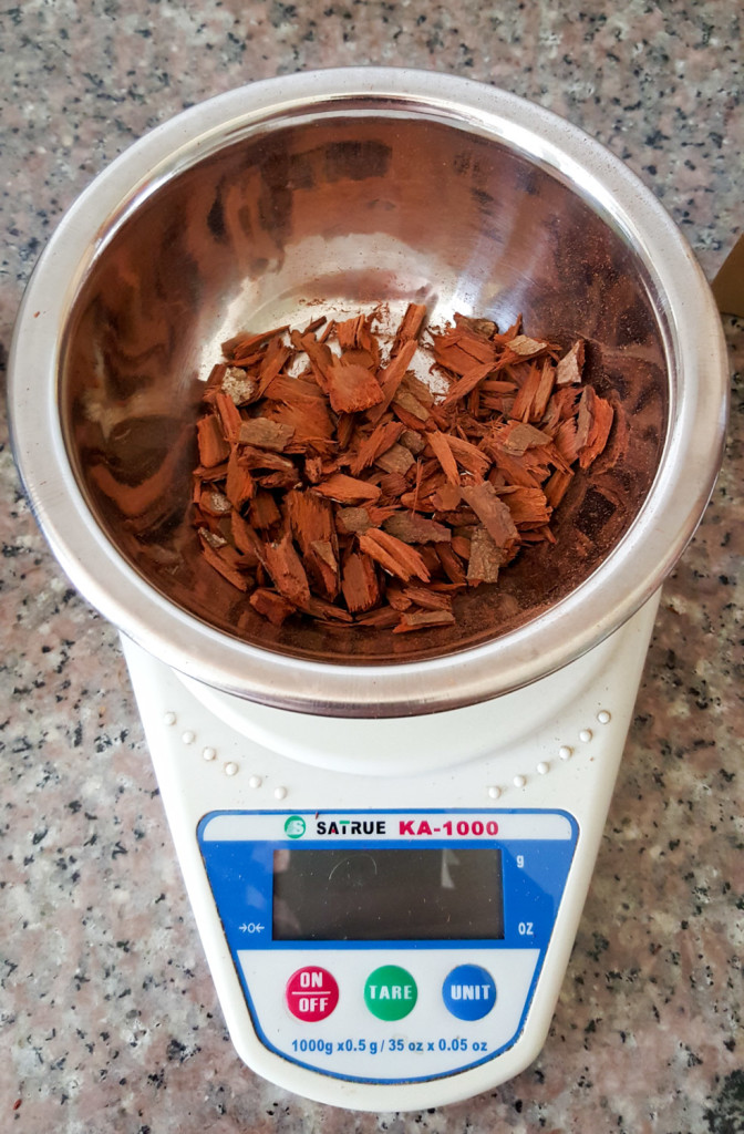 Break the bark into smaller pieces once you realise they don't fit into your grinder.