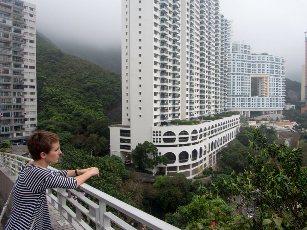 Esther looks out over Repulse Bay. And yes, that building on the right does have a hole in it.